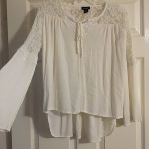 White loose long sleeve shirt.